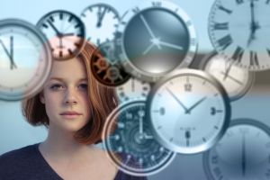 woman with clocks managing time