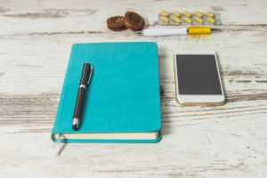 notebook–and-pen-for-coaching