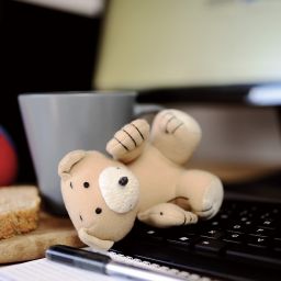 computer and toys to show working mum