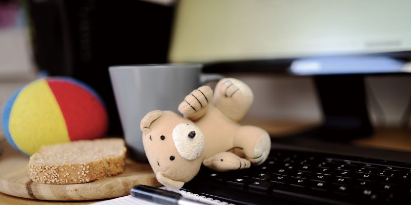 computer and toys to show working mum