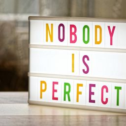 SIgn saying Nobody Is Perfect