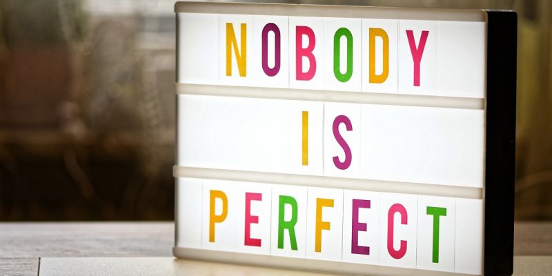 SIgn saying Nobody Is Perfect