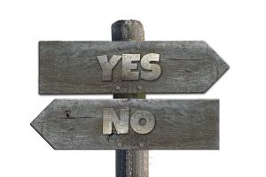 sign pointing one way to yes and another way to no